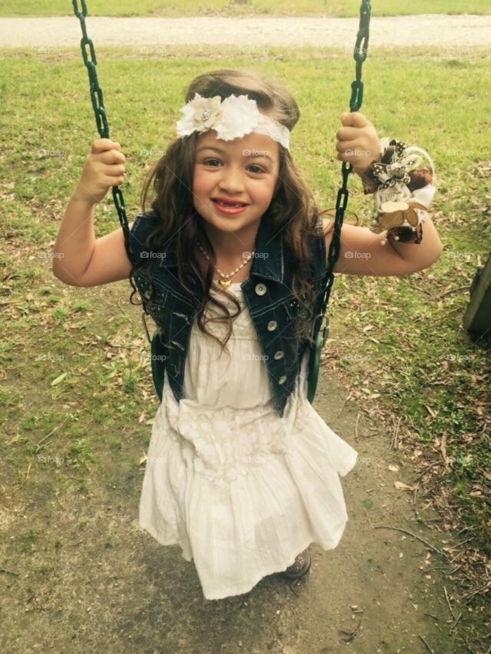 Swinging with flowers in my hair 