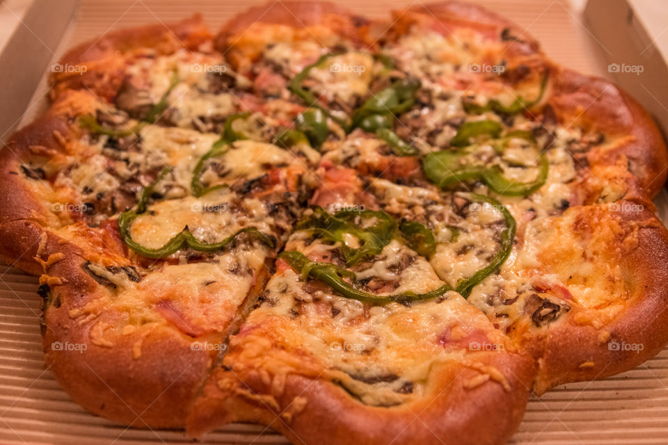 Delicious Tasty Pizza In A Cardboard Box
