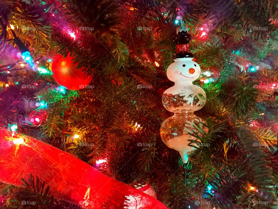 Snowman In A Tree