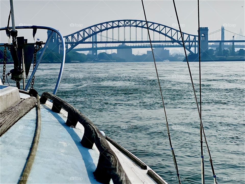 We are approaching “Hell Gate Bridge” on the way back from “Mamaroneck” to “Newtown Creek” in LIC, Queens. “Hell Gate” is known for its whirlpool like undercurrents that can cause a boat to spin around in circles .2023. Hypnotic Productions