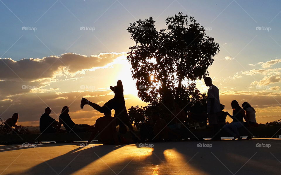 capoeira. dancing capoeira at sunset