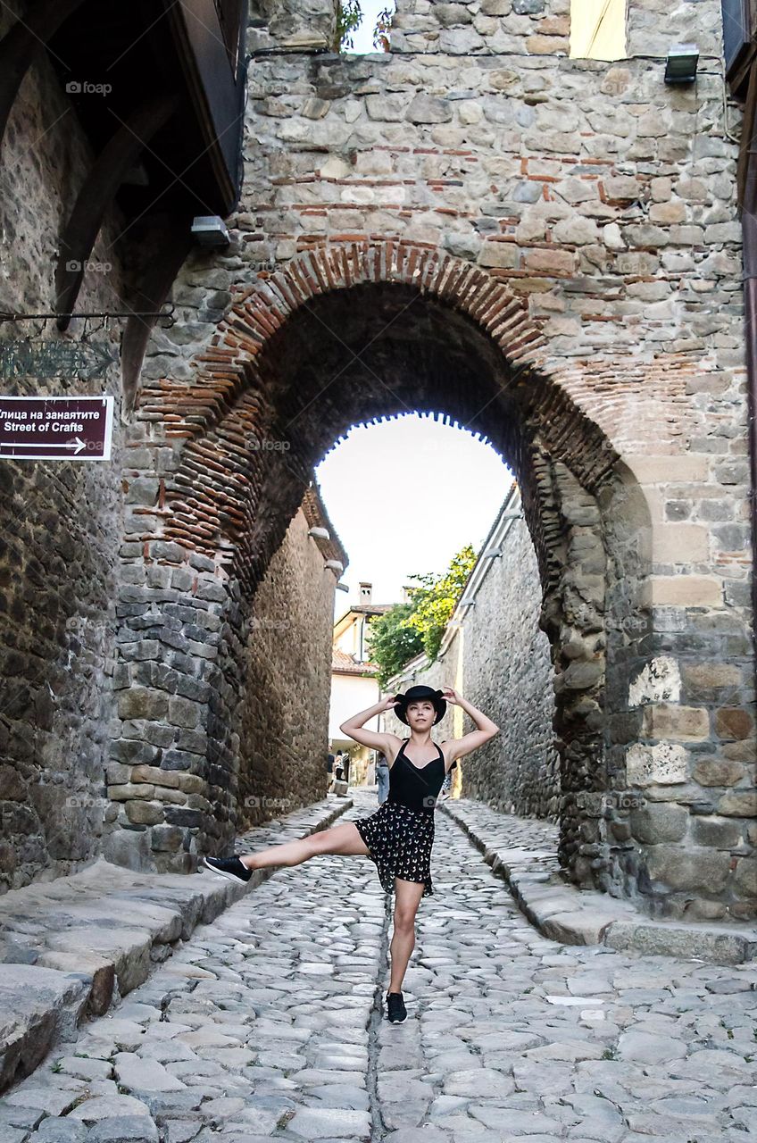 Young Female Ballerina Dancing Outside