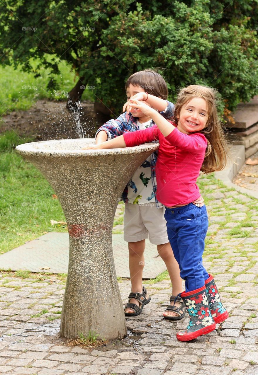 Children playing with water