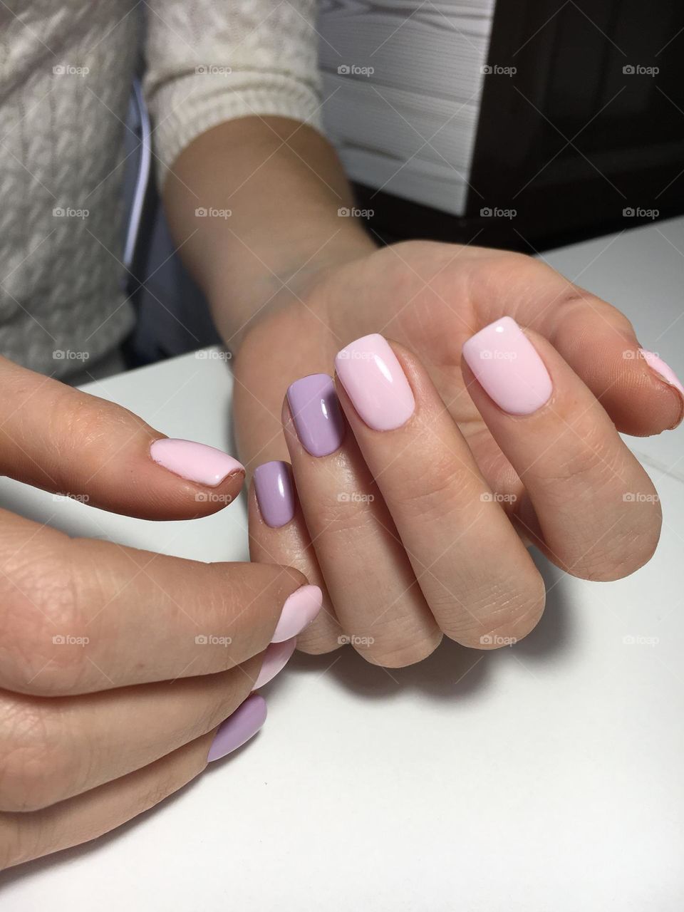 Painted nails, gel polish on nails, women's beautiful and neat manicure