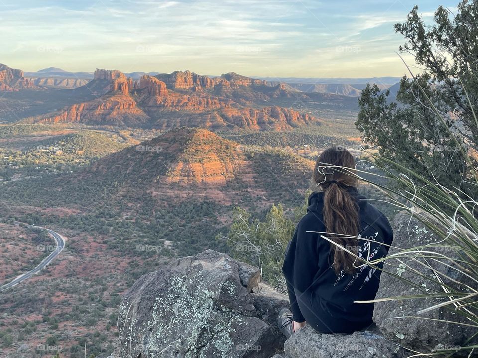 Girl admiring the sunset in Sedona Arizona