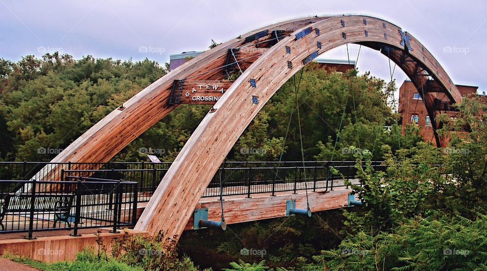 New modern walking bridge wood and steel