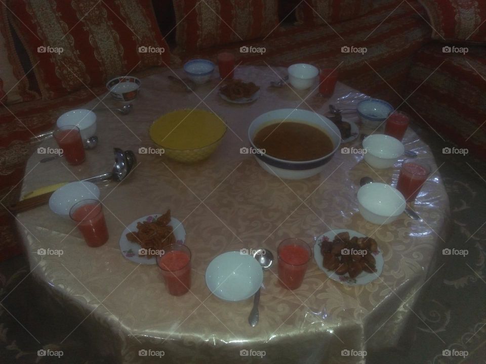 Moroccan table in ramadan month: various soups and dates.