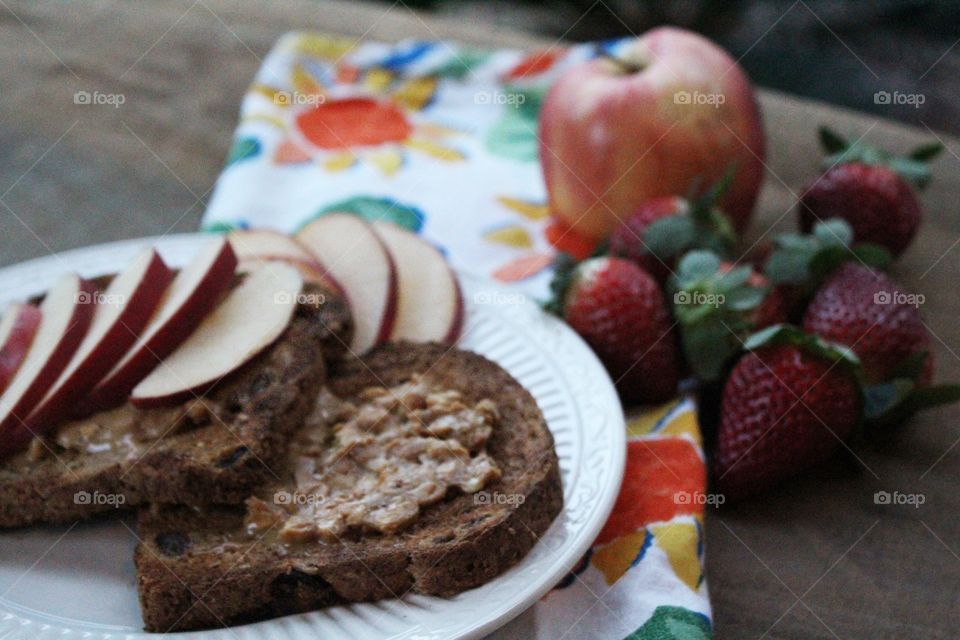 Breakfast toast with peanut butter and apple slices 