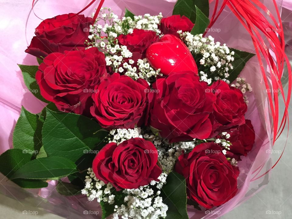 a bouquet of red roses.