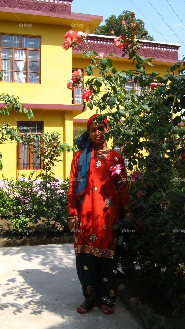 Indian Gardener Captured Amongst her Roses