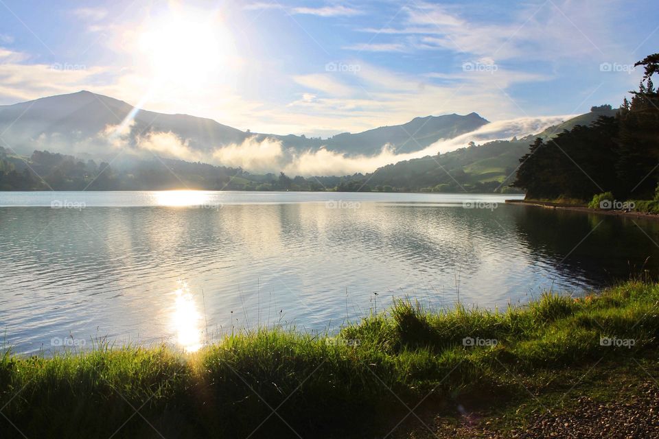 Scenic view of lake in foggy morning