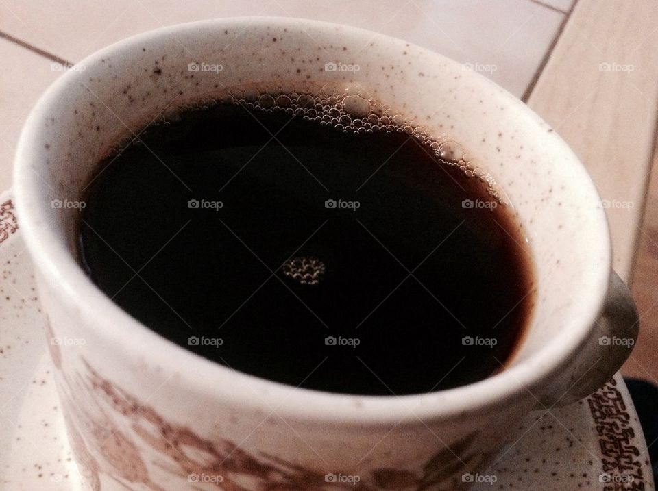 Coffee cup with bubbles