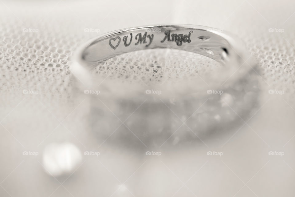 Wedding ring with engraved lovely words, closeup