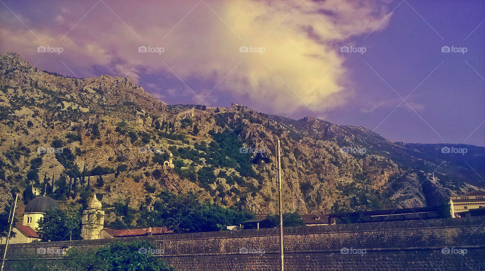 amazing mountains and sky. city and fortress