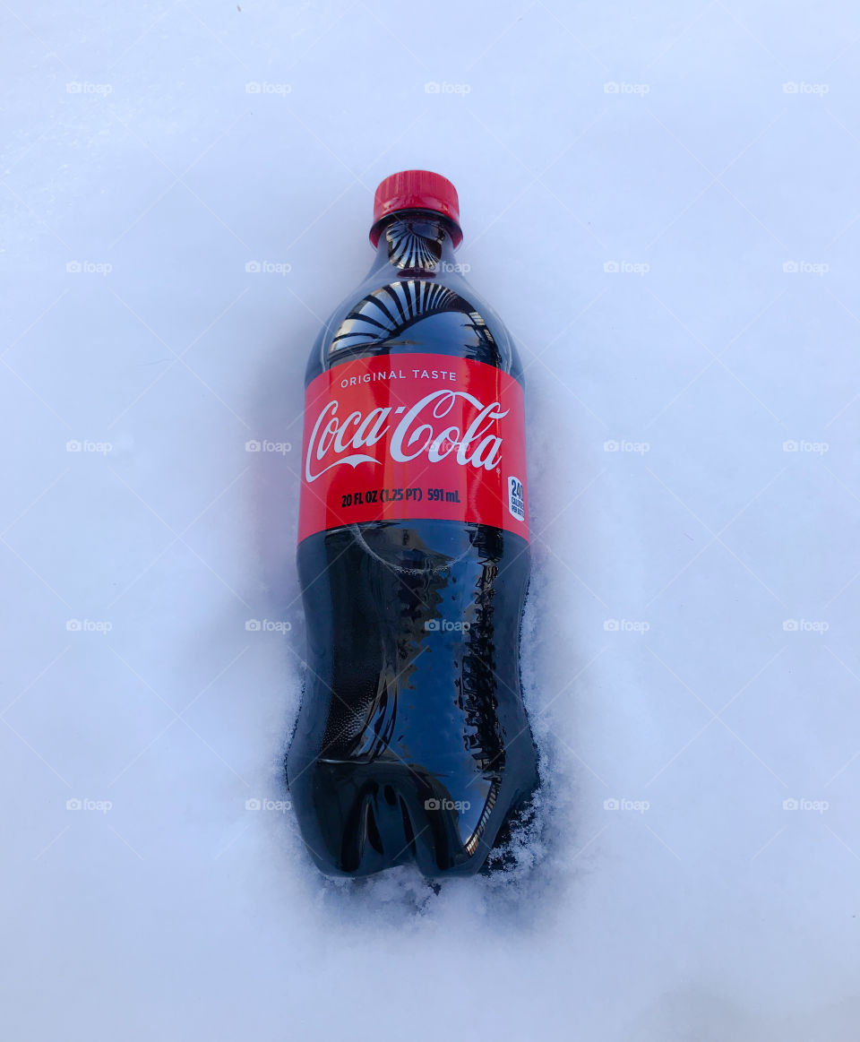 Coke bottle in the snow
