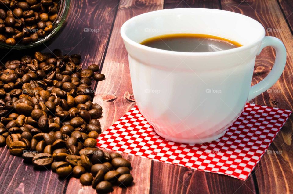 coffee been still life on wooden background