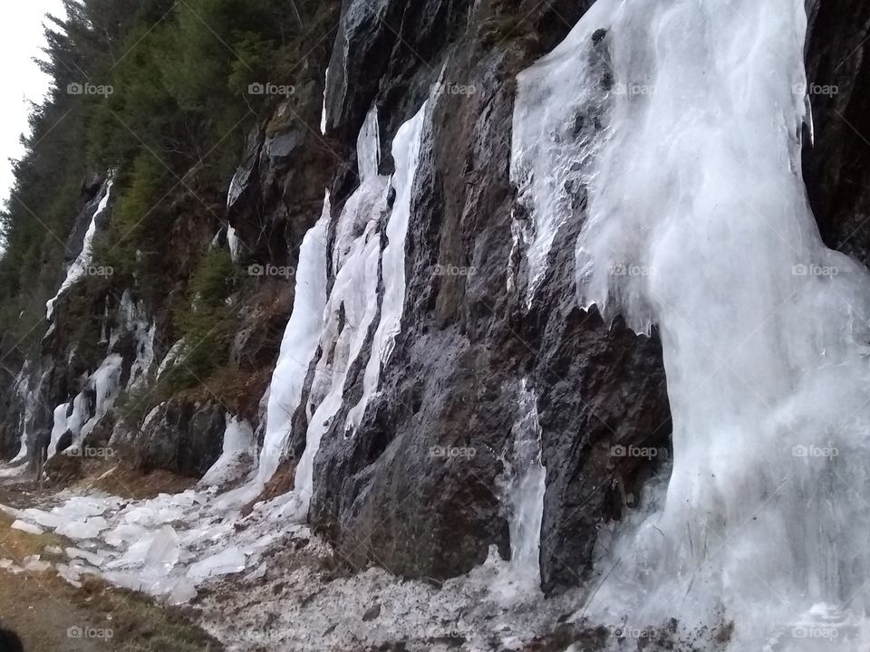 icy rocks on highway