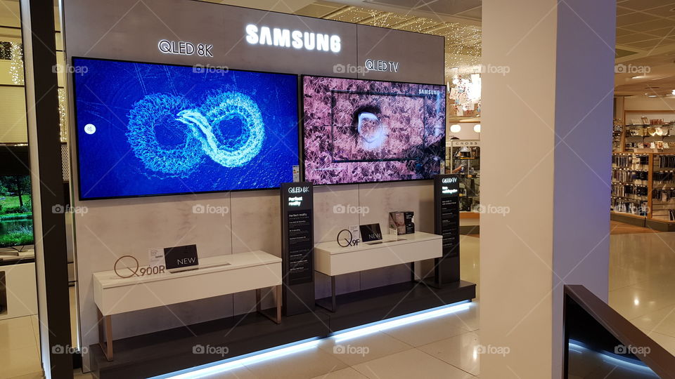 Samsung QLED 8K and 4K UHD TV wall mounted televisions