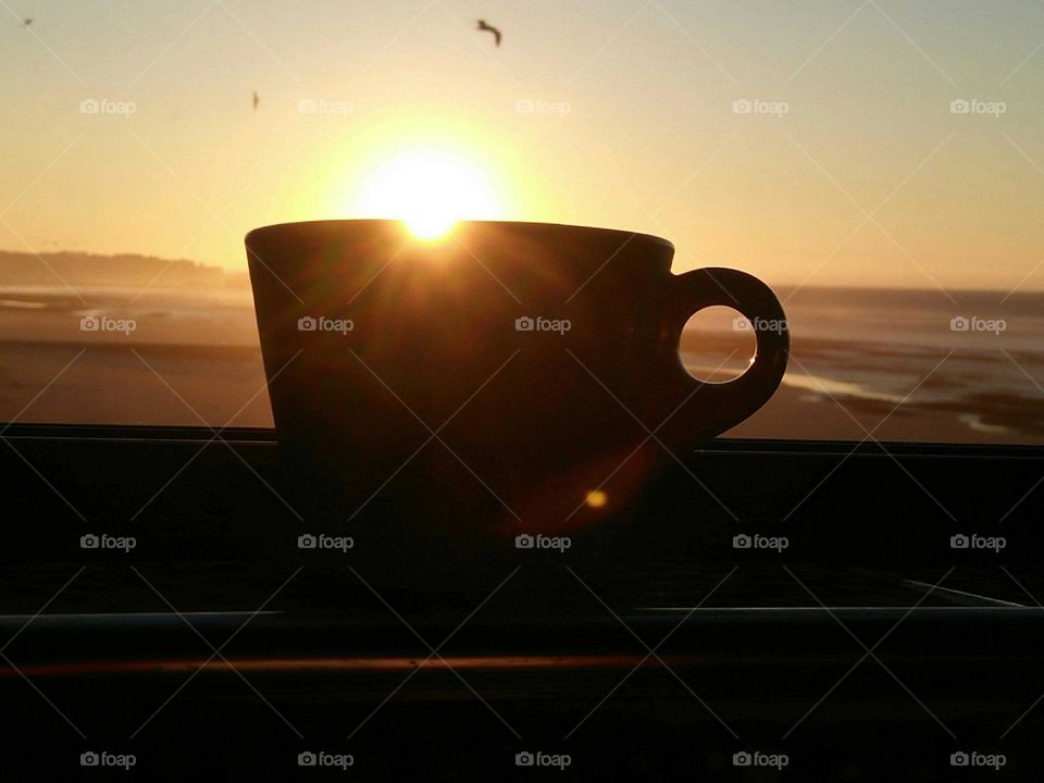 Beautiful cup and view to sunset.