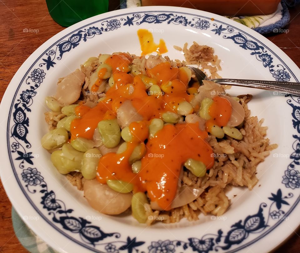 leftovers for lunch, Lima beans and rice with hot sauce.