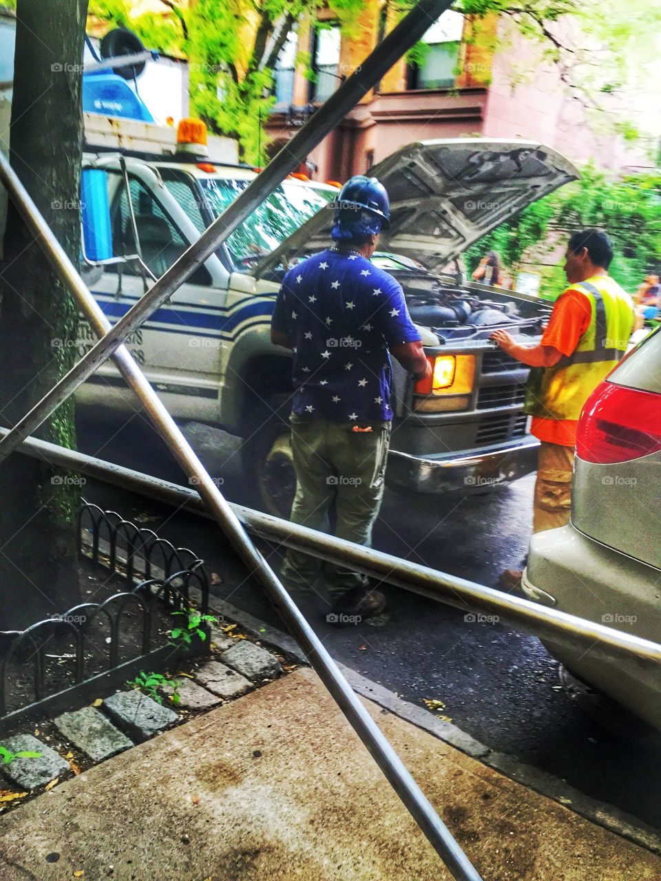 Engineers. Men working on a van