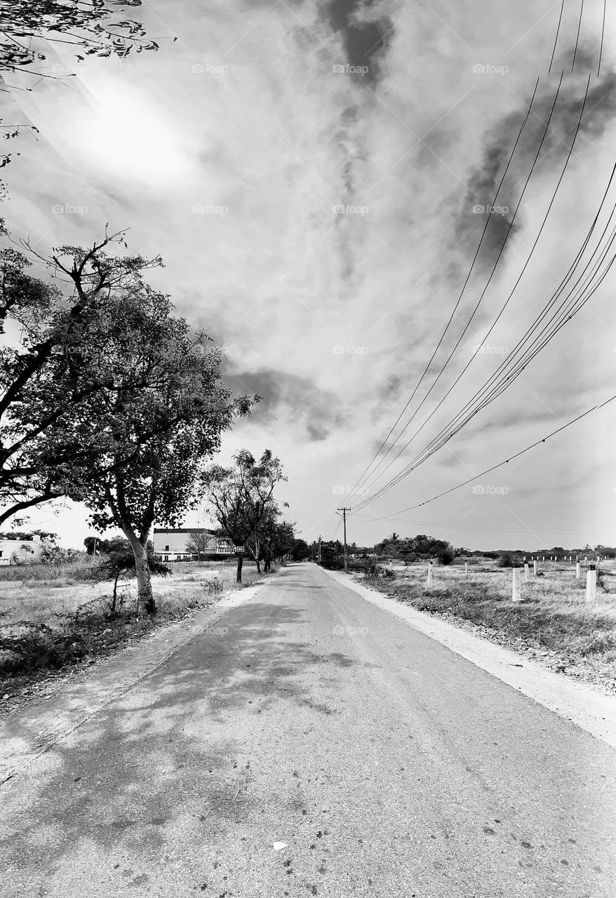 Monochromatic photography - A milky cloud and road 