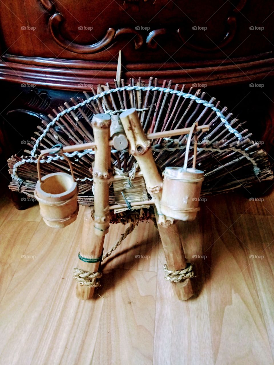 the mini water jar and the basket that's used for the collected woods.