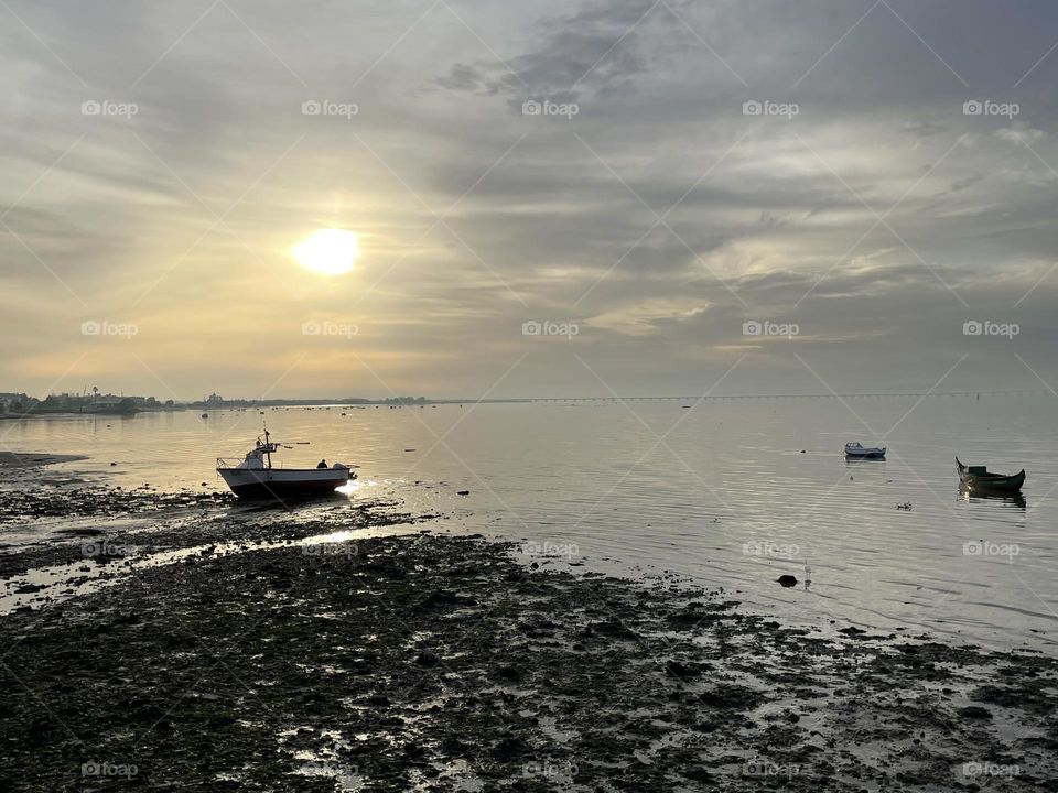 Sunset boats in the river