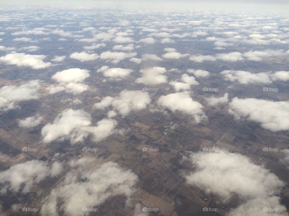 Puffy clouds from aerial view 