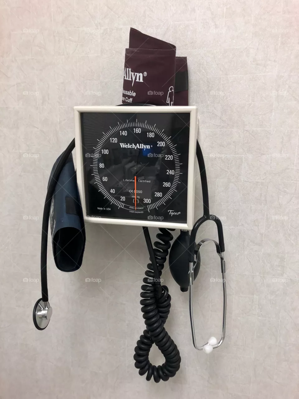 Sphygmomanometer and stethoscope. 