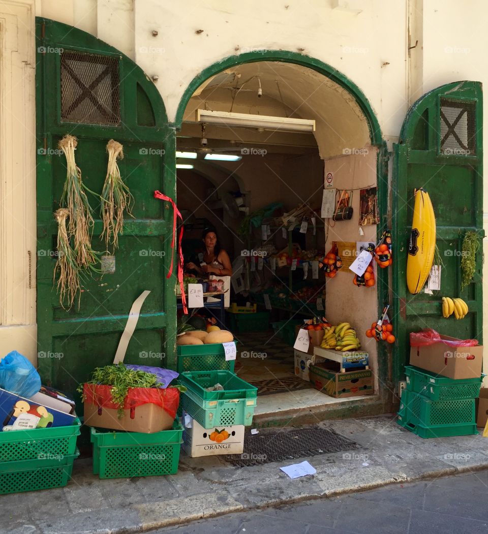 Lovely Maltese market in Valetta, with beautiful scenery and gorgeous shops just like this!