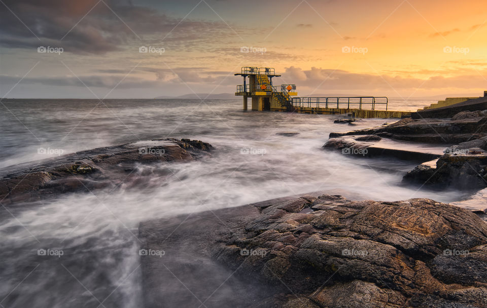 Evening at Blacrock diving tower on Salthill beach in Galway city, Ireland