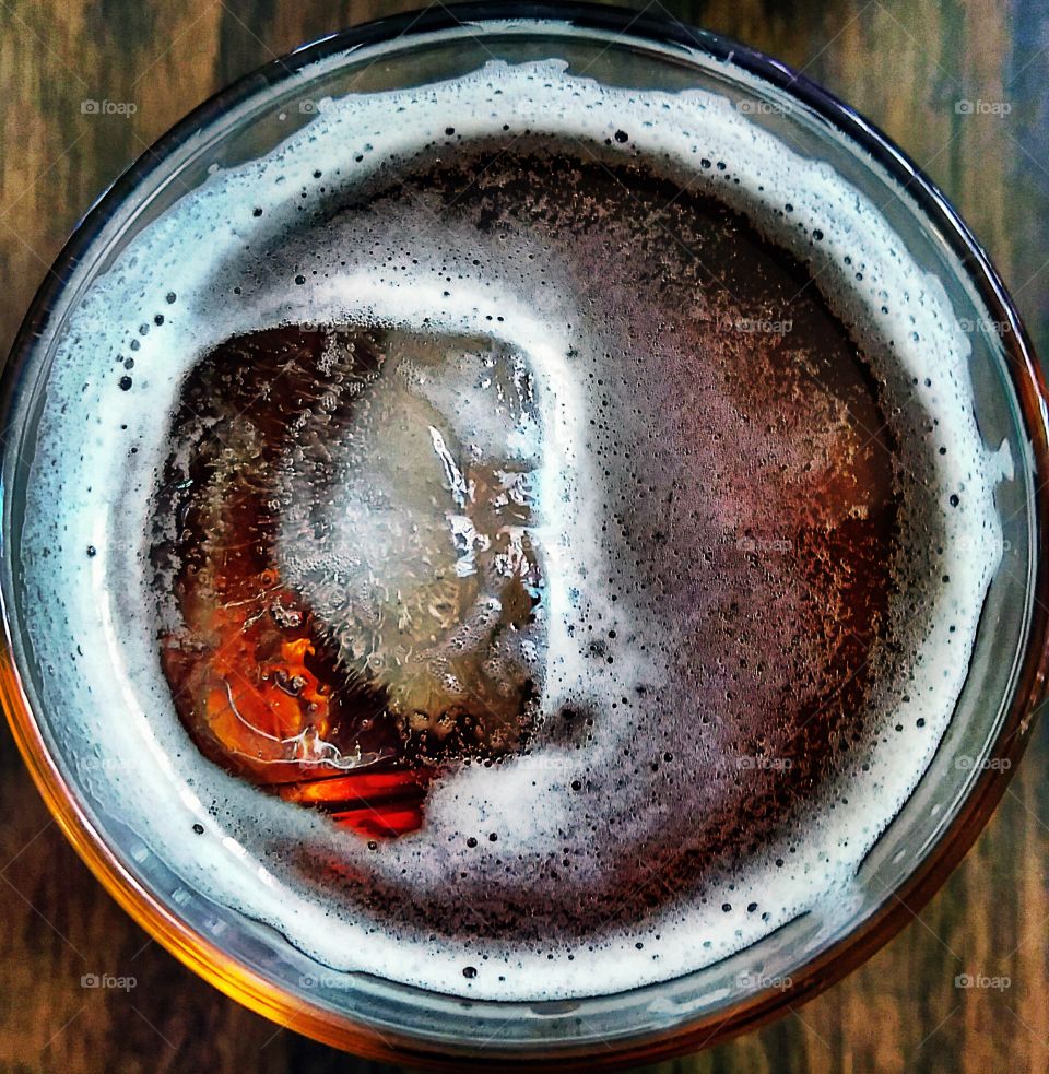 I call this the 51 special! It's my birthday today I turned 51. Ice, whiskey, beer, glass.