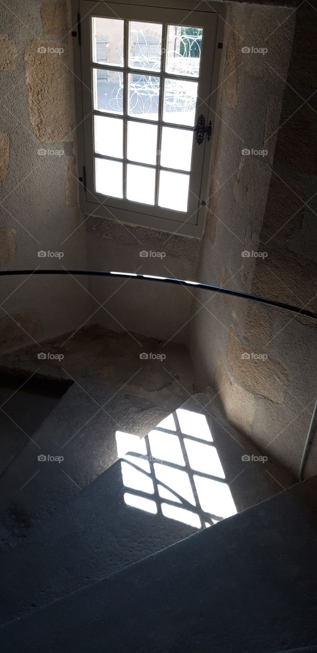 window inside the castle of Rochechouart