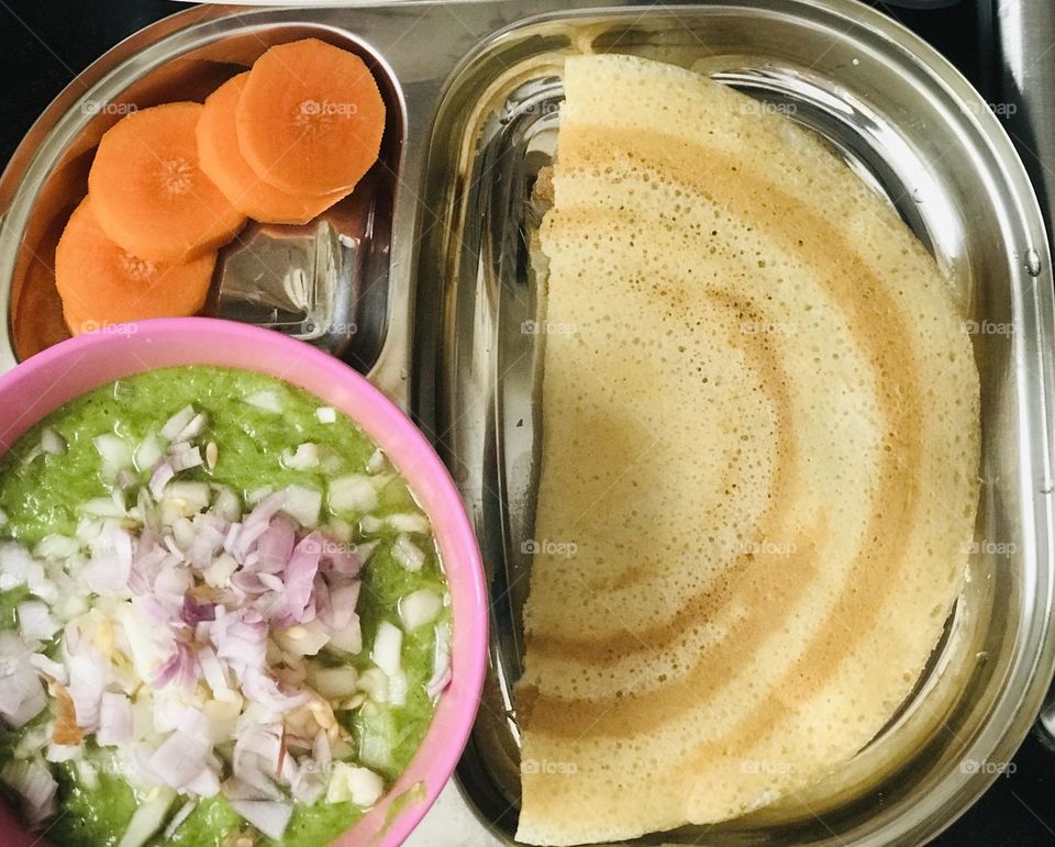 South Indian famous dosa along with green chutney 