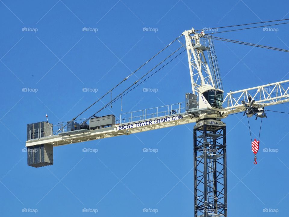 Giant Engineering Crane. Crane building a skyscraper