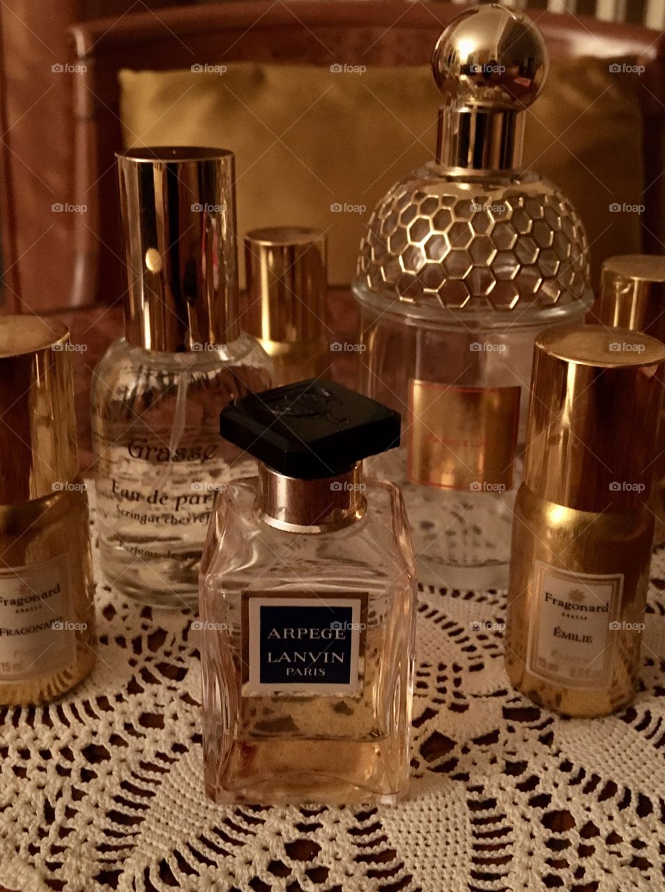 Display of perfume bottles in intimate mood