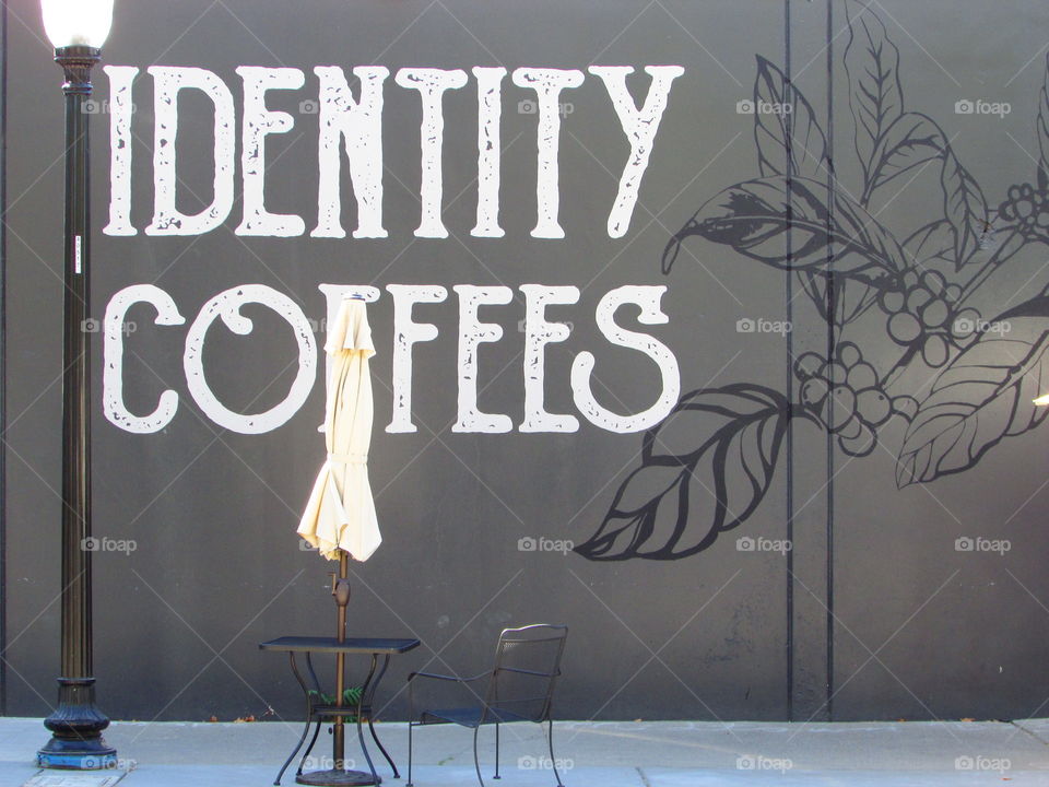 coffee shop patio scene, at a small coffee shop in downtown Sacramento