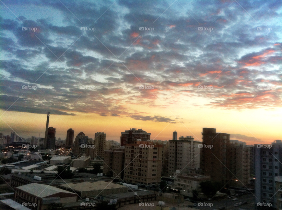 grey orange clouds sun by LisAm