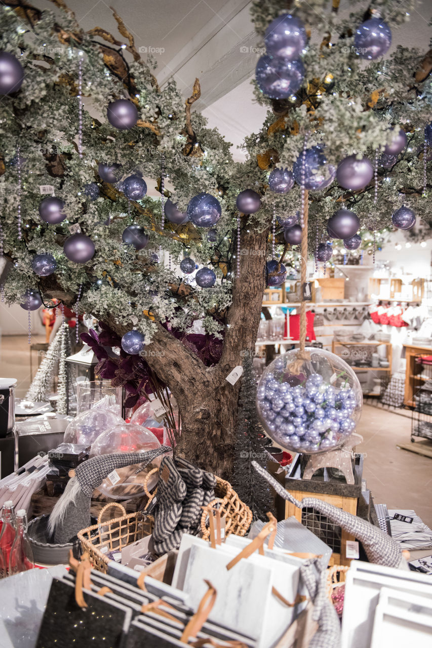 Christmas tree ornaments and decorations on display in a store in Sweden.