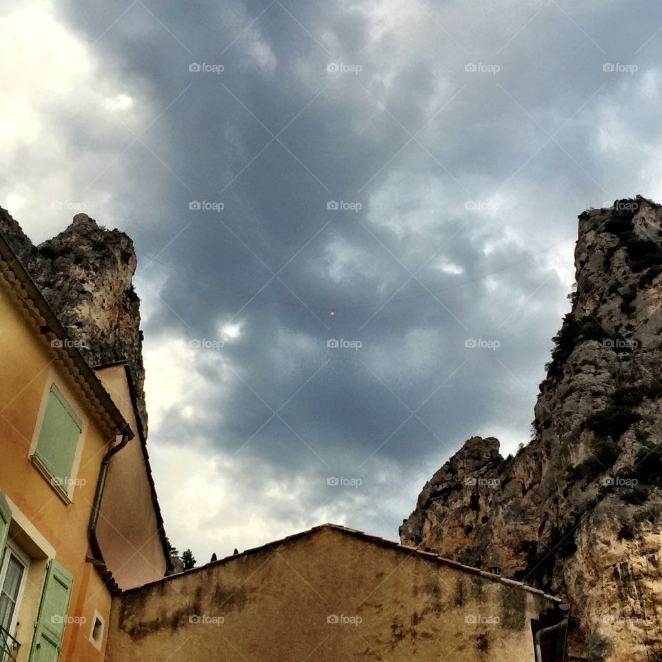 Mountains and houses with a star in the middle in Moustier Sainte Marie, France
