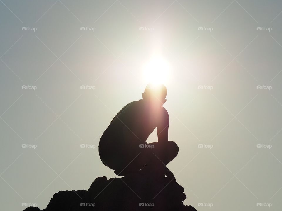 A silhouette photo trying to play with the sun. It was taken while I was traveling to the south of Thailand