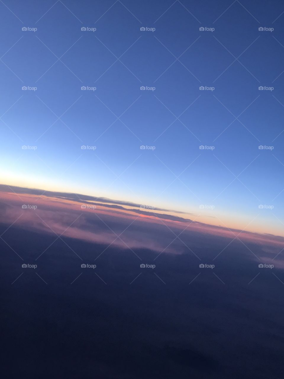 Earth and sky colliding. Beautiful skyline and colors. Taken upon arrival cabin signal. 