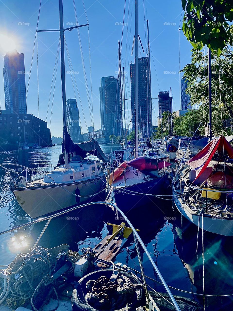 This is “Newtown Creek” by the “Pulaski Bridge” in LIC, Queens seen from aboard “Salvation”, the “28 ft 1969 Luhrs” cabin cruiser we call home. Today is the last really warm Indian summer day this year in early October 2023. Hypnotic Productions