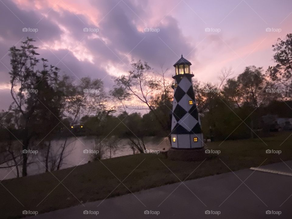 Clouds galore waiting for a good representation of sunset while passing clouds shroud my picture. Turned out nice. 