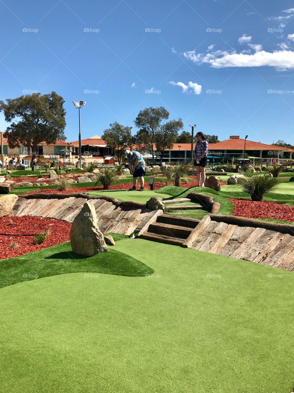 Playing mini golf