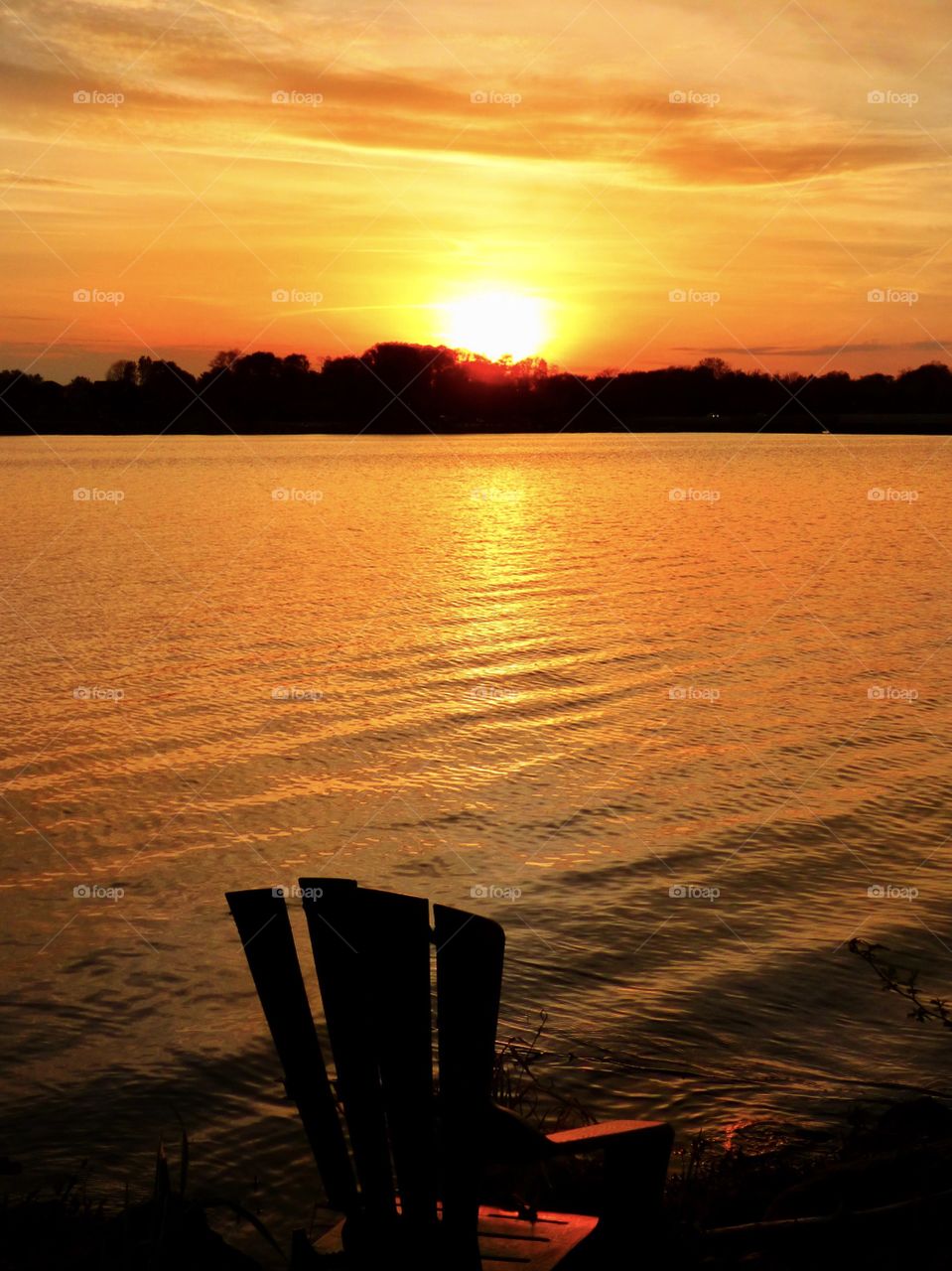 Sit and enjoy the sunset on the lake in beautiful Indiana 