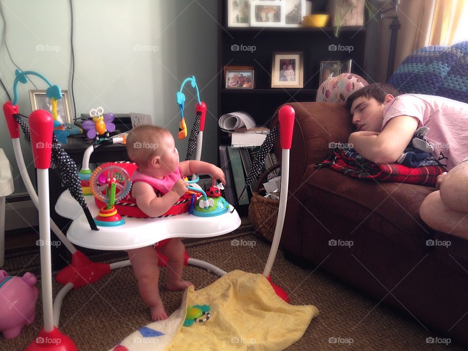 Shouldn't I be napping? . The baby watching her cousin sleep...