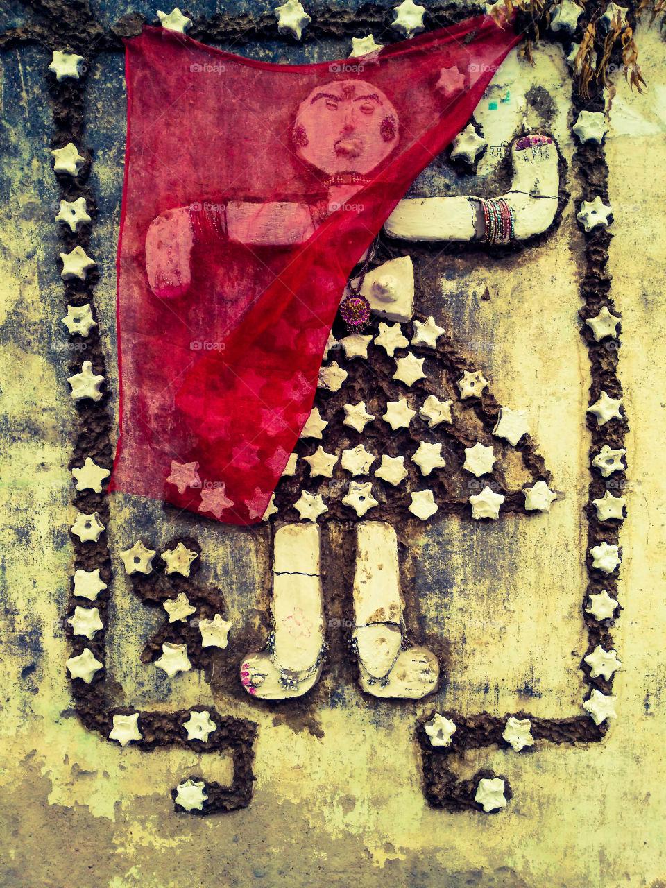 Wall stone carving of a woman