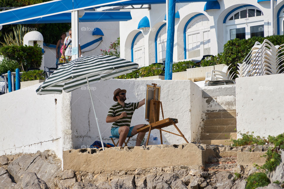 Painting by the seaside